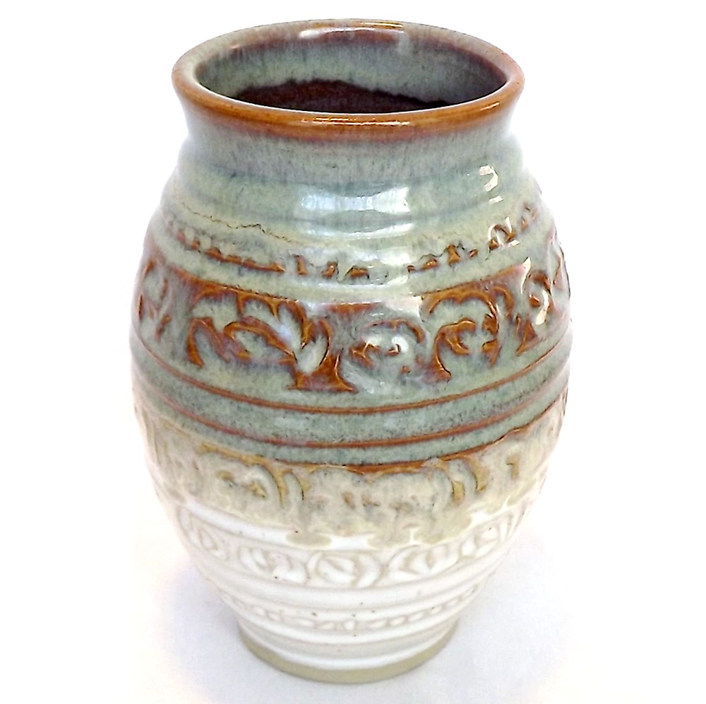 carved pottery vase